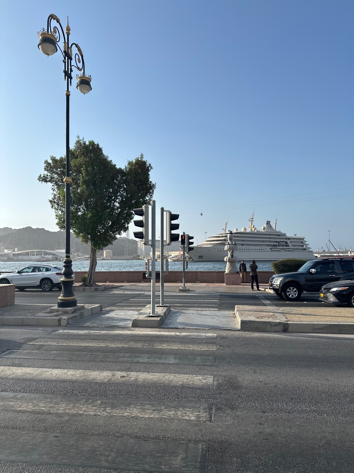 Muscat corniche with ship on the water