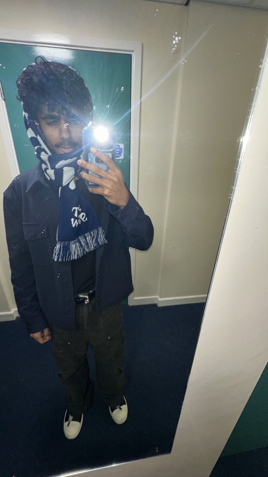 Mirror study in a corridor